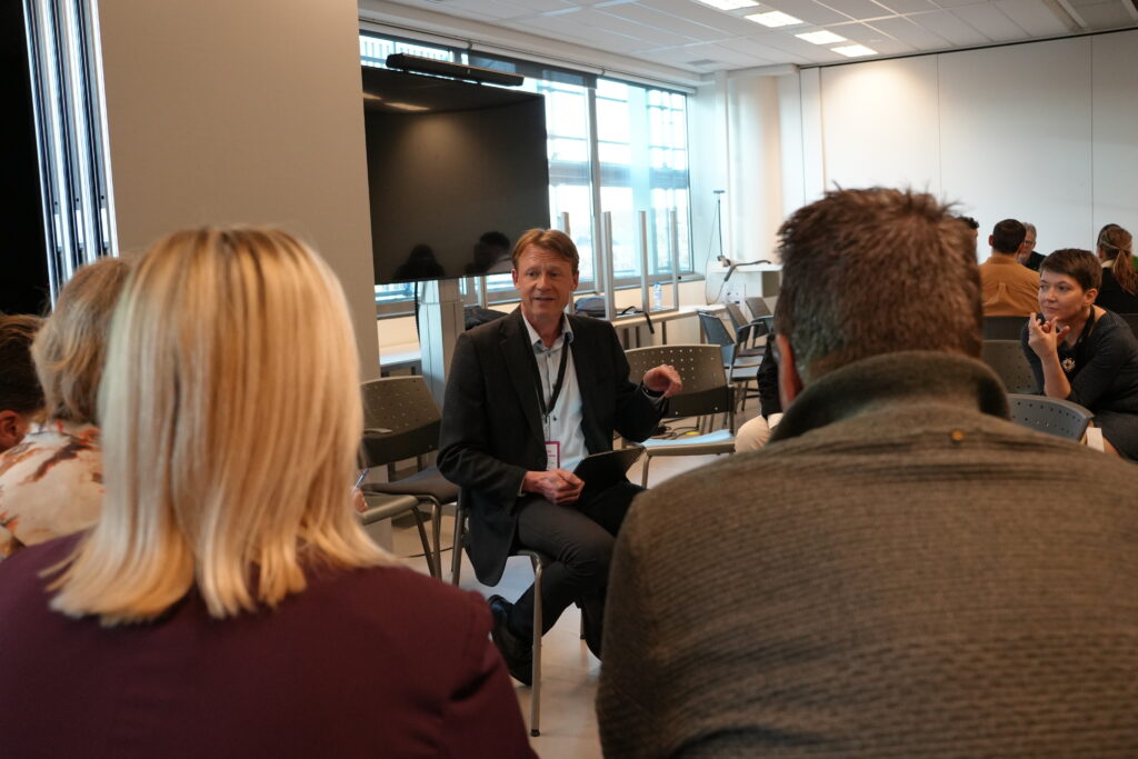 Participants discussing using the fishbowl method, where one group sits in an inner circle to converse, while the rest of the participants observe from an outer ring. The discussions focused on The role of dialogue with working life, The Skills4Retail approach, From Research to Production: Rapid Rollout of Policy-Compliant Mcs and Designing Micro-Credentials for Soft Skills: Scalable, Learner-Centric Frameworks for Employability and Lifelong Learning